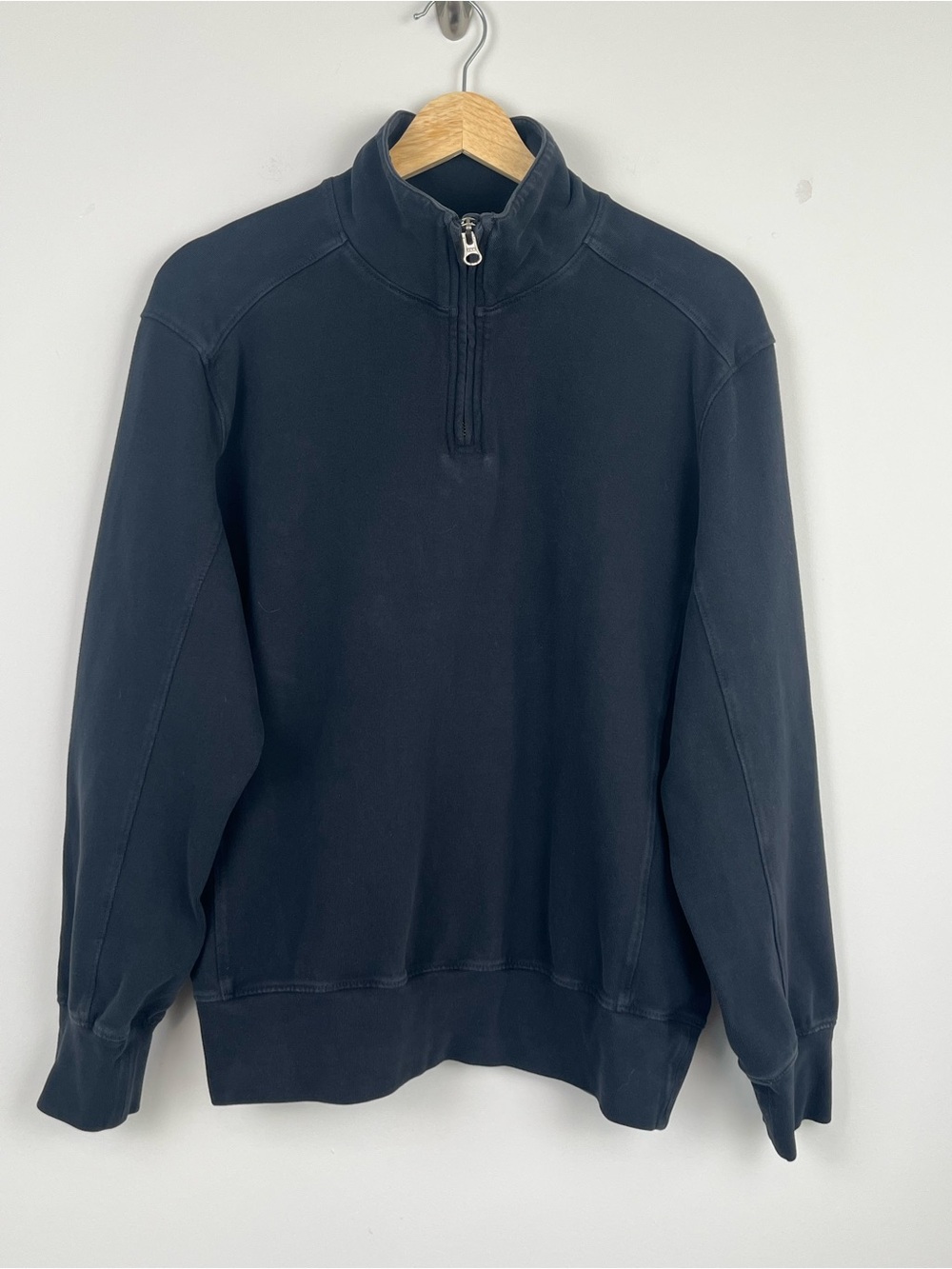 Pact black organic cotton elastane 1/4 zip, size medium.